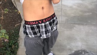 Dressed and showing boxers