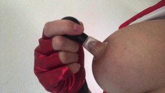 Submissive Harley Quinn pumps her nipples and milks her tits for Daddy
